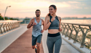 Man and woman athletes running needing IV Therapy in Scarsdale, NY