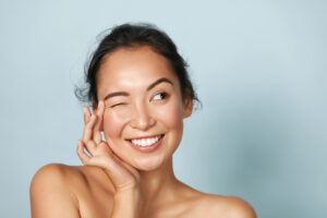 Woman smiling with fresh face glow from Hydrafacial in Scarsdale, NY